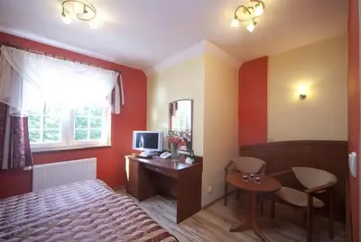 Telewizja i/lub zestaw kina domowego w obiekcie Pensjonat Perła Polanicy