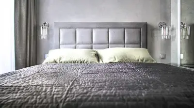 Łóżko lub łóżka w pokoju w obiekcie Apartament Wrocławska 29