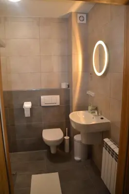 Łazienka w obiekcie Hotel Tenis