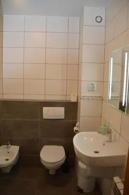 Łazienka w obiekcie Hotel Tenis