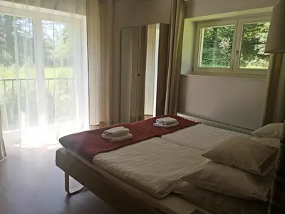 Łóżko lub łóżka w pokoju w obiekcie Orańska