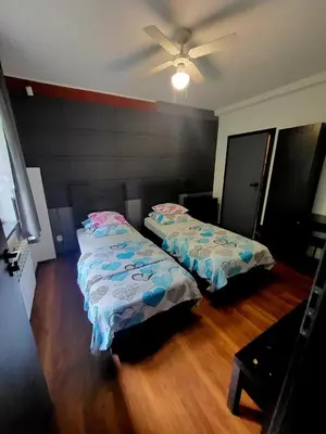 Łóżko lub łóżka w pokoju w obiekcie M Hostel