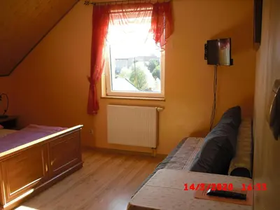 Łóżko lub łóżka w pokoju w obiekcie Pokoje Gościnne HANA