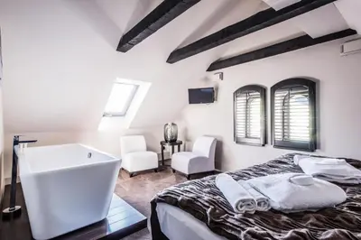 Łóżko lub łóżka w pokoju w obiekcie Hotel Pałac Jugowice