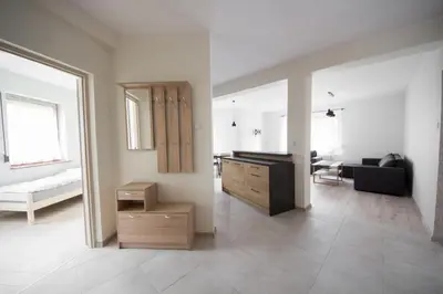 Łóżko lub łóżka w pokoju w obiekcie Apartament Zebcowska