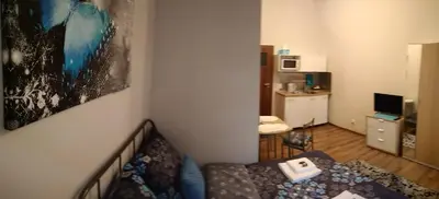 Telewizja i/lub zestaw kina domowego w obiekcie noclegi Wieckowskiego