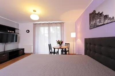 Telewizja i/lub zestaw kina domowego w obiekcie Sleep Well Wroclavia / Dyrekcyjna