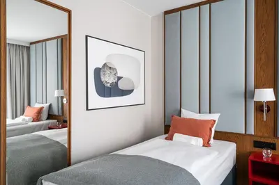 Łóżko lub łóżka w pokoju w obiekcie RentPlanet - Apartamenty Centrum