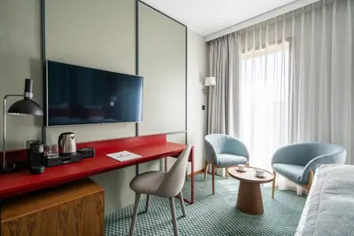 Telewizja i/lub zestaw kina domowego w obiekcie RentPlanet - Apartamenty Centrum