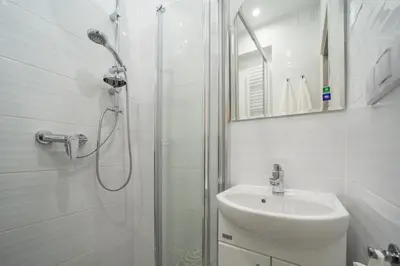Łazienka w obiekcie White Vision Apartment