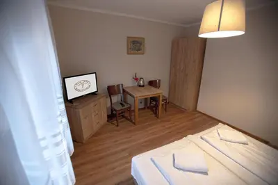 Łóżko lub łóżka w pokoju w obiekcie Dom Nad Wodospadem