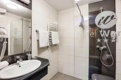 Łazienka w obiekcie Hotel Weneda