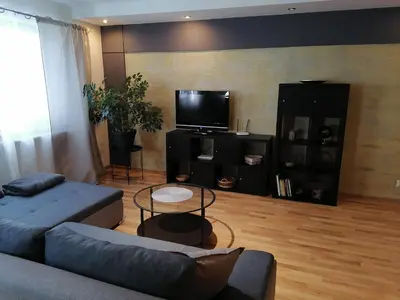 Telewizja i/lub zestaw kina domowego w obiekcie Apartamenty pod Dzikowcem