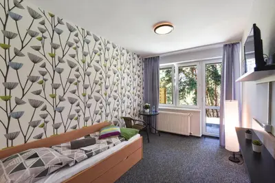 Łóżko lub łóżka w pokoju w obiekcie KAMION Ośrodek Wypoczynkowy