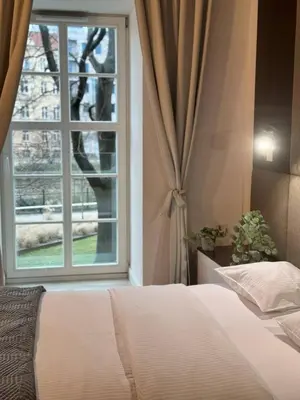 Łóżko lub łóżka w pokoju w obiekcie AbsyntApartments 24 Rynek Wrocław