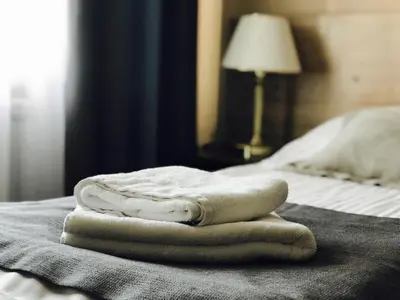 Łóżko lub łóżka w pokoju w obiekcie Hotel Stajnia Wolica
