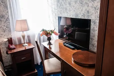 Telewizja i/lub zestaw kina domowego w obiekcie Pałac Myśliwski w Antoninie