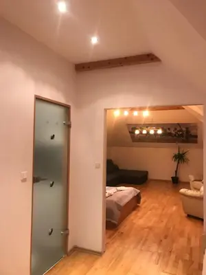 Łóżko lub łóżka w pokoju w obiekcie Apartamenty w ogrodzie