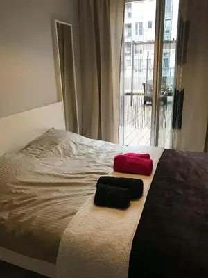 Łóżko lub łóżka w pokoju w obiekcie Apartament nad Odrą z tarasem