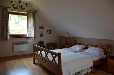 Łóżko lub łóżka w pokoju w obiekcie Dom Na Pstrążnicy