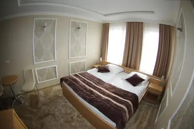 Łóżko lub łóżka w pokoju w obiekcie Hotel Pod Złotą Koroną
