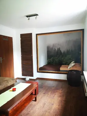 Łóżko lub łóżka w pokoju w obiekcie Pod Gadającym Kotem
