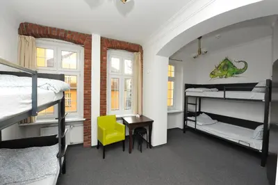 Łóżko lub łóżka w pokoju w obiekcie Hostel Wratislavia