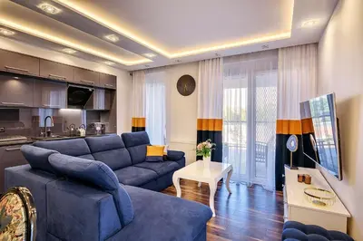 Telewizja i/lub zestaw kina domowego w obiekcie About Art Apartments - Sikorskiego
