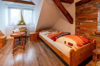 Łóżko lub łóżka w pokoju w obiekcie Gospodarstwo Agroturystyczne Nad Zalewem