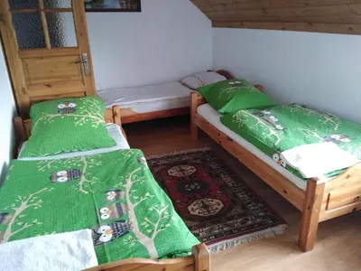 Łóżko lub łóżka w pokoju w obiekcie Gospodarstwo Agroturystyczne Nad Zalewem