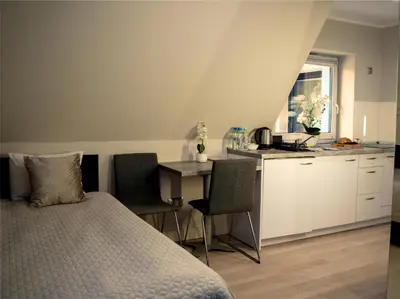 Łóżko lub łóżka w pokoju w obiekcie Apartamenty Pyskowice