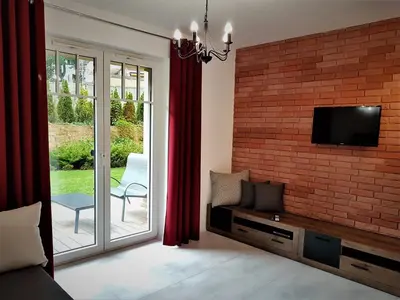 Telewizja i/lub zestaw kina domowego w obiekcie Lux Apartment Park
