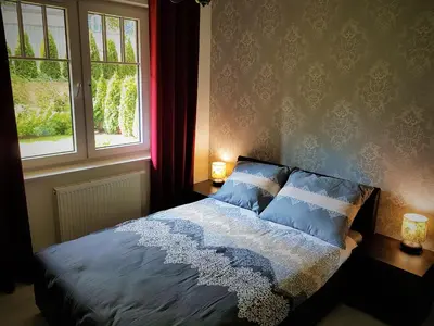 Łóżko lub łóżka w pokoju w obiekcie Lux Apartment Park