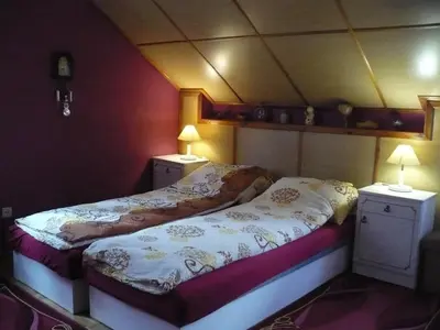 Łóżko lub łóżka w pokoju w obiekcie Pokoje gościnne u Andrzeja