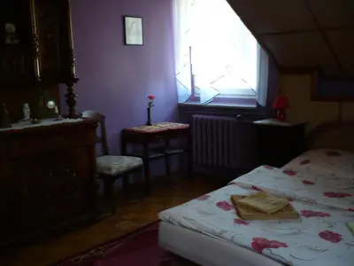 Łóżko lub łóżka w pokoju w obiekcie Pokoje gościnne u Andrzeja