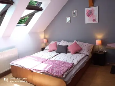Łóżko lub łóżka w pokoju w obiekcie Pokoje Gościnne Nad Złotym Potokiem