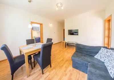 Telewizja i/lub zestaw kina domowego w obiekcie Apartament Zdrojowy przy Parku