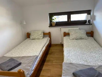 Łóżko lub łóżka w pokoju w obiekcie Agroturystyka Bobrowniki