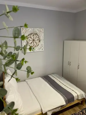 Łóżko lub łóżka w pokoju w obiekcie Ratuszowa 13