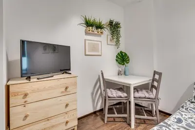 Telewizja i/lub zestaw kina domowego w obiekcie Apartament Szczęśliwa Trzynastka