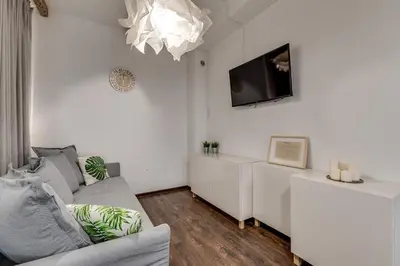 Telewizja i/lub zestaw kina domowego w obiekcie Apartament Szczęśliwa Trzynastka