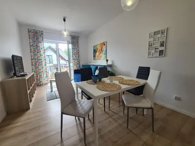 Telewizja i/lub zestaw kina domowego w obiekcie APARTAMENTY 