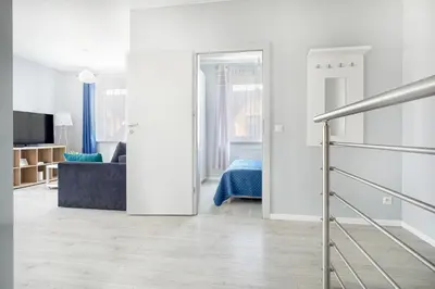 Telewizja i/lub zestaw kina domowego w obiekcie APARTAMENTY 