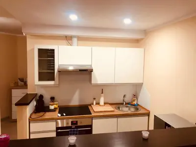 Kuchnia lub aneks kuchenny w obiekcie Apartamenty ALICJA