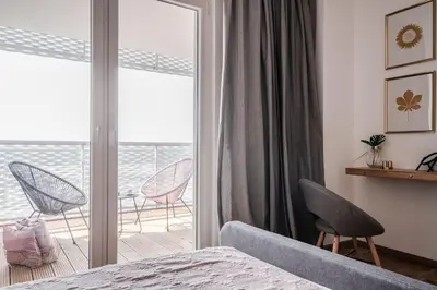 Łóżko lub łóżka w pokoju w obiekcie RentPlanet - Apartamenty Atal Tower