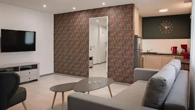 Telewizja i/lub zestaw kina domowego w obiekcie Apartament Piano 3