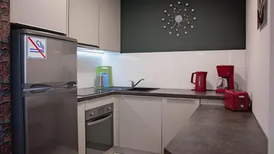 Kuchnia lub aneks kuchenny w obiekcie Apartament Piano 3