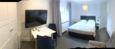 Łóżko lub łóżka w pokoju w obiekcie Pensjonat Kapitan