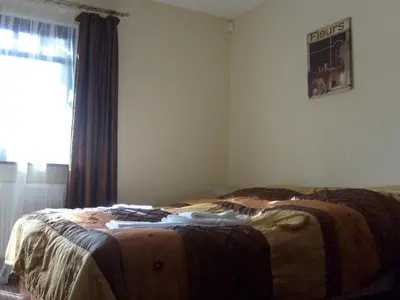 Łóżko lub łóżka w pokoju w obiekcie Willa Lawenda