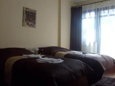 Łóżko lub łóżka w pokoju w obiekcie Willa Lawenda